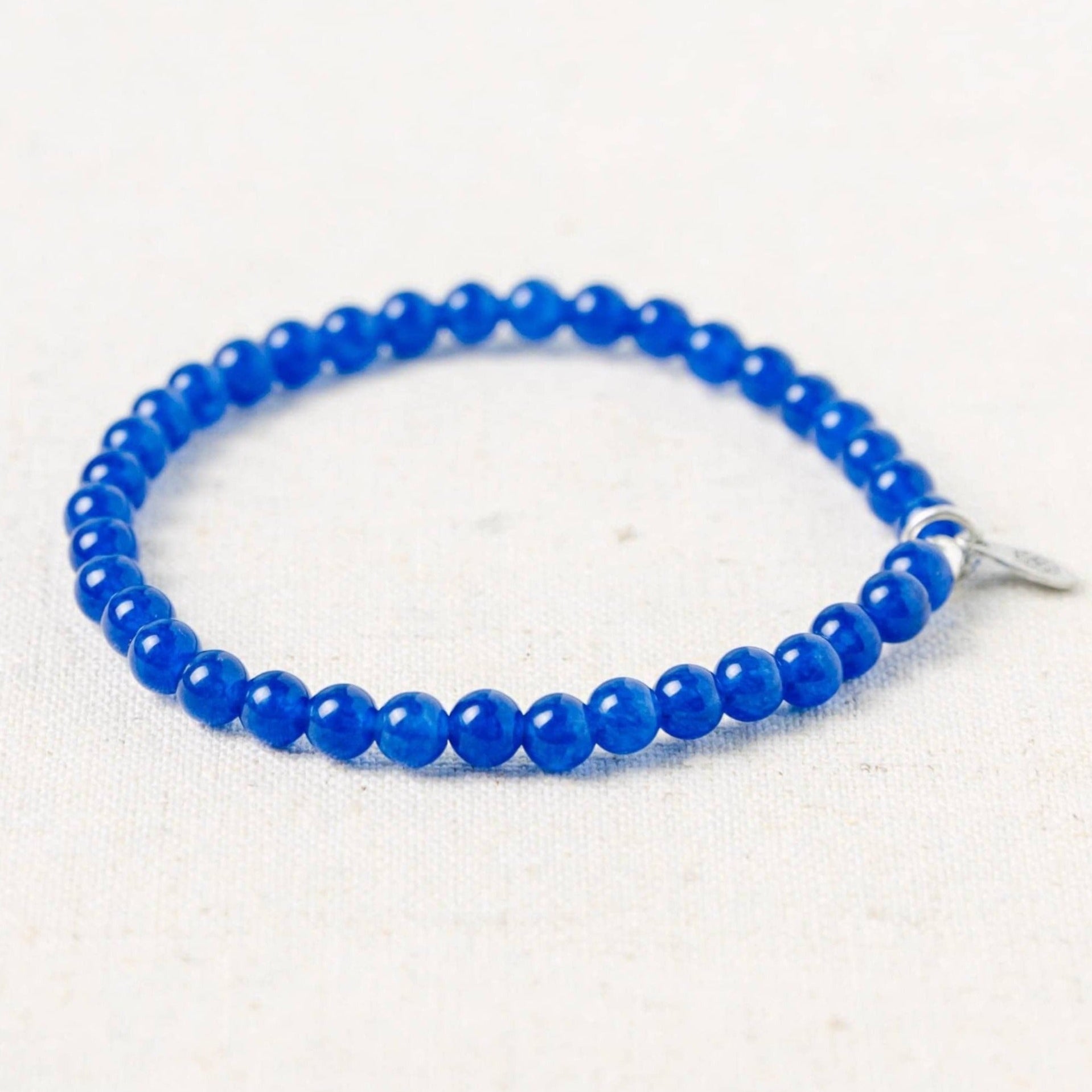 SPStudio_TinyRitualsIMG_1421_dea1aa9d-cde9-451e-aa18-b7e8ced30ae7 Dark Blue Jade Energy Bracelet - Image 1