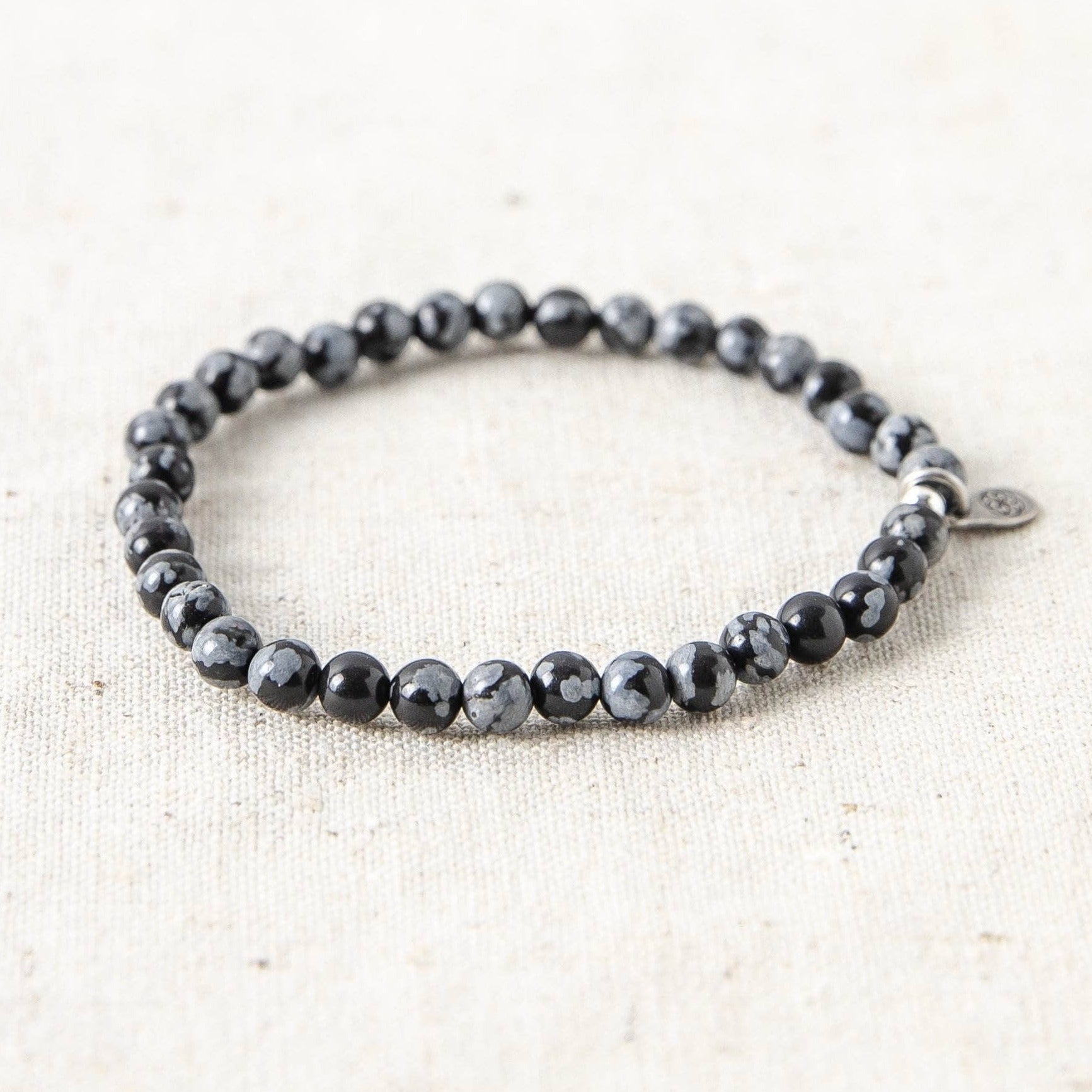 SP_TinyRituals_3959 Snowflake Obsidian Energy Bracelet - Image 1