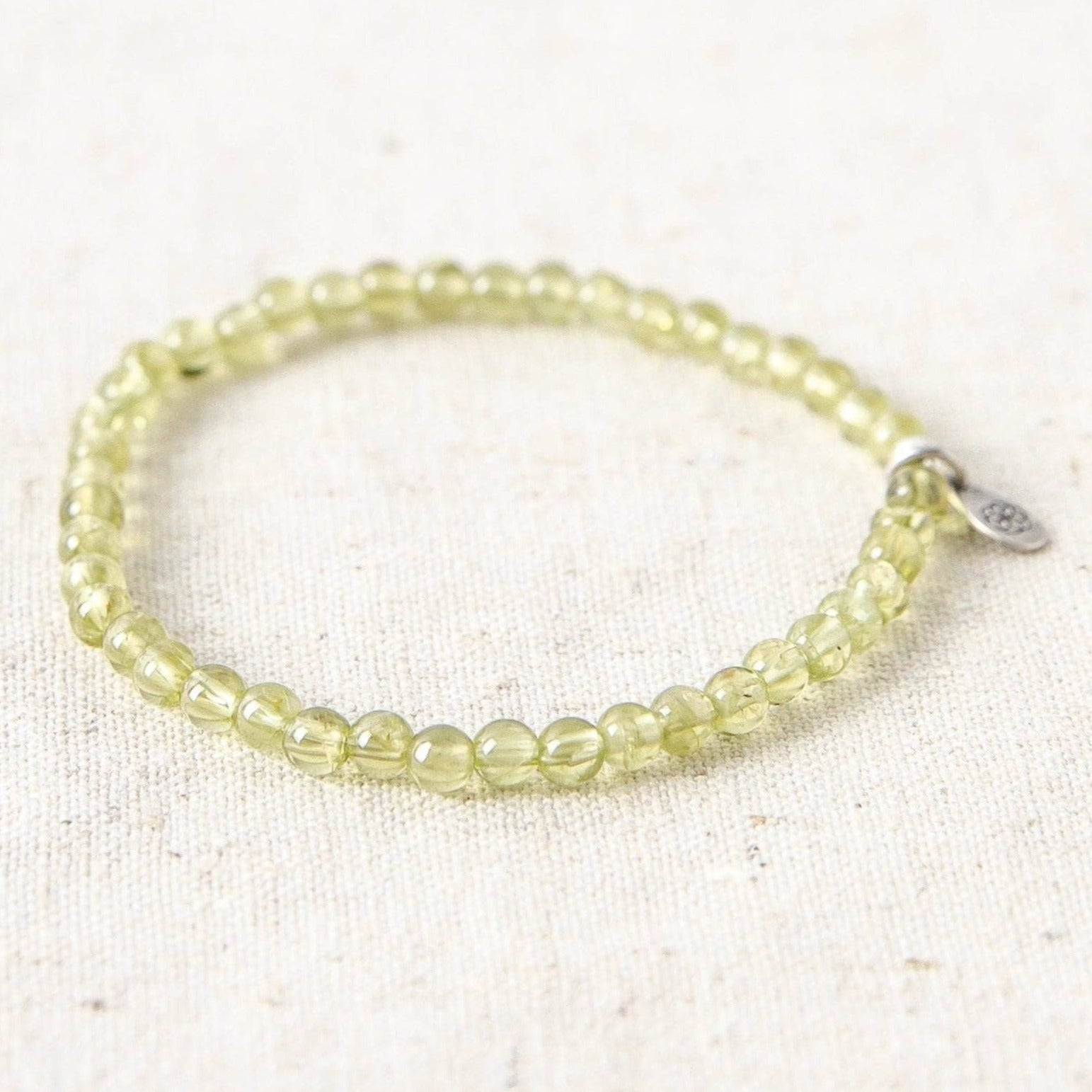 SP_TinyRituals_4069 Peridot Energy Bracelet - Image 1