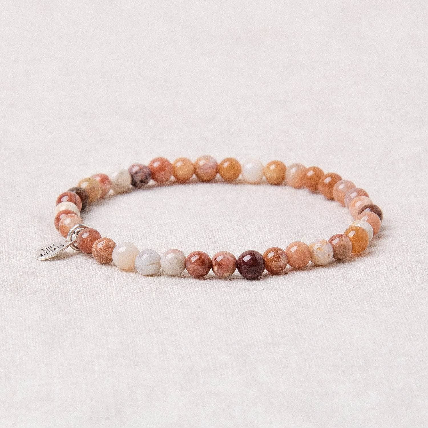 Studio-Session-1426-2 Petrified Wood Jade Energy Bracelet - Image 4