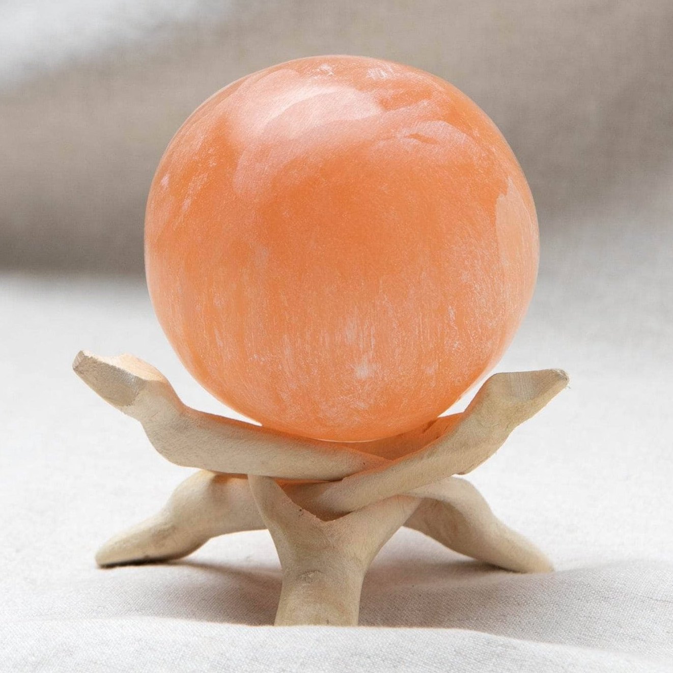 Studio-Session-994-2 Peach Selenite Sphere with Tripod - Image 1