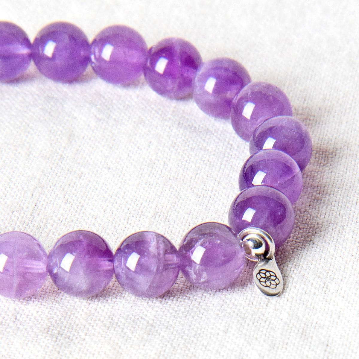 StudioSession-17500-1 Amethyst Energy Bracelet 8mm - Image 5