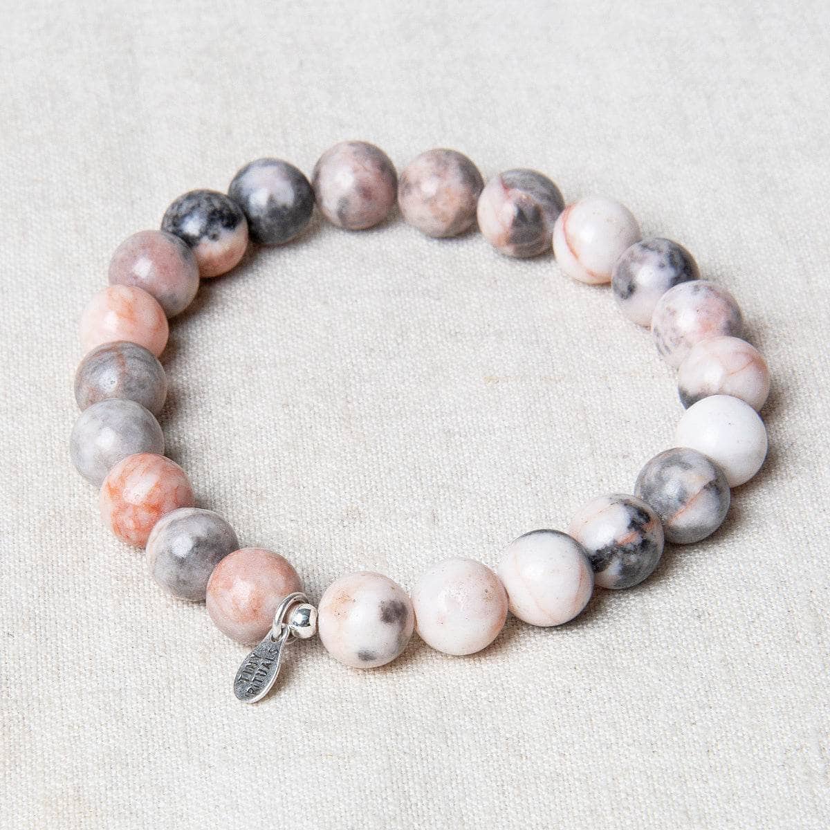 StudioSession-19962-1 Pink Zebra Jasper Energy Bracelet 8mm - Image 1