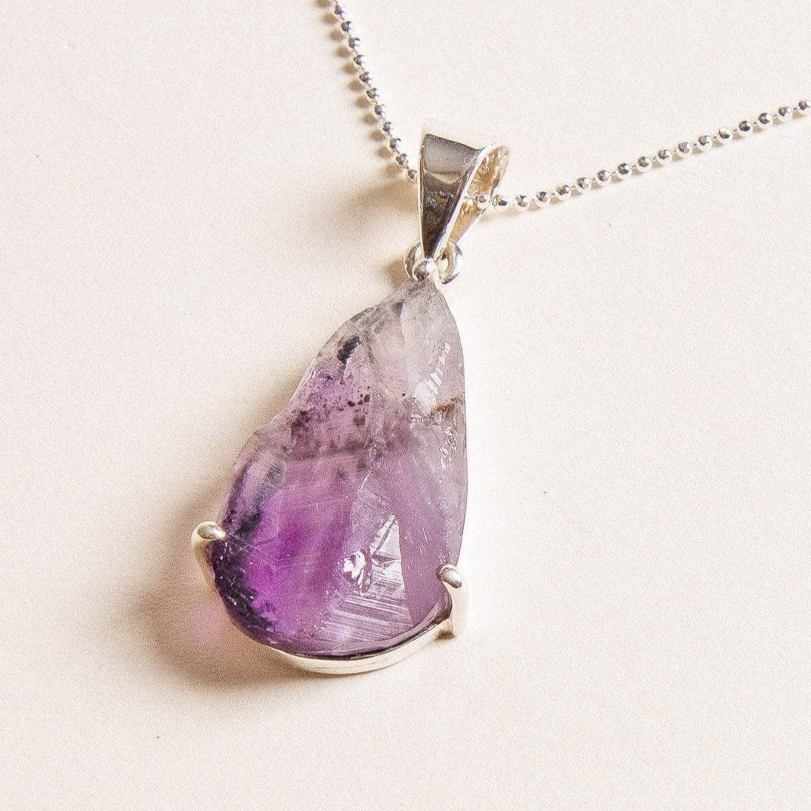StudioSession-30490-3 Raw Amethyst Teardrop Gemstone Pendant - Image 3