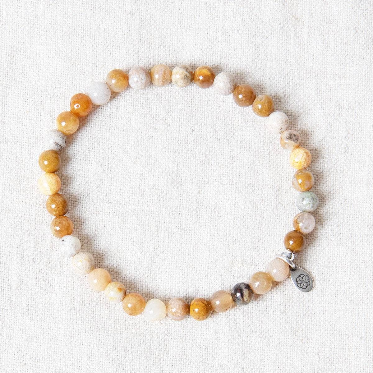 StudioSession-33670-3 Natural Coral Jade Chrysanthemum Energy Bracelet - Image 1