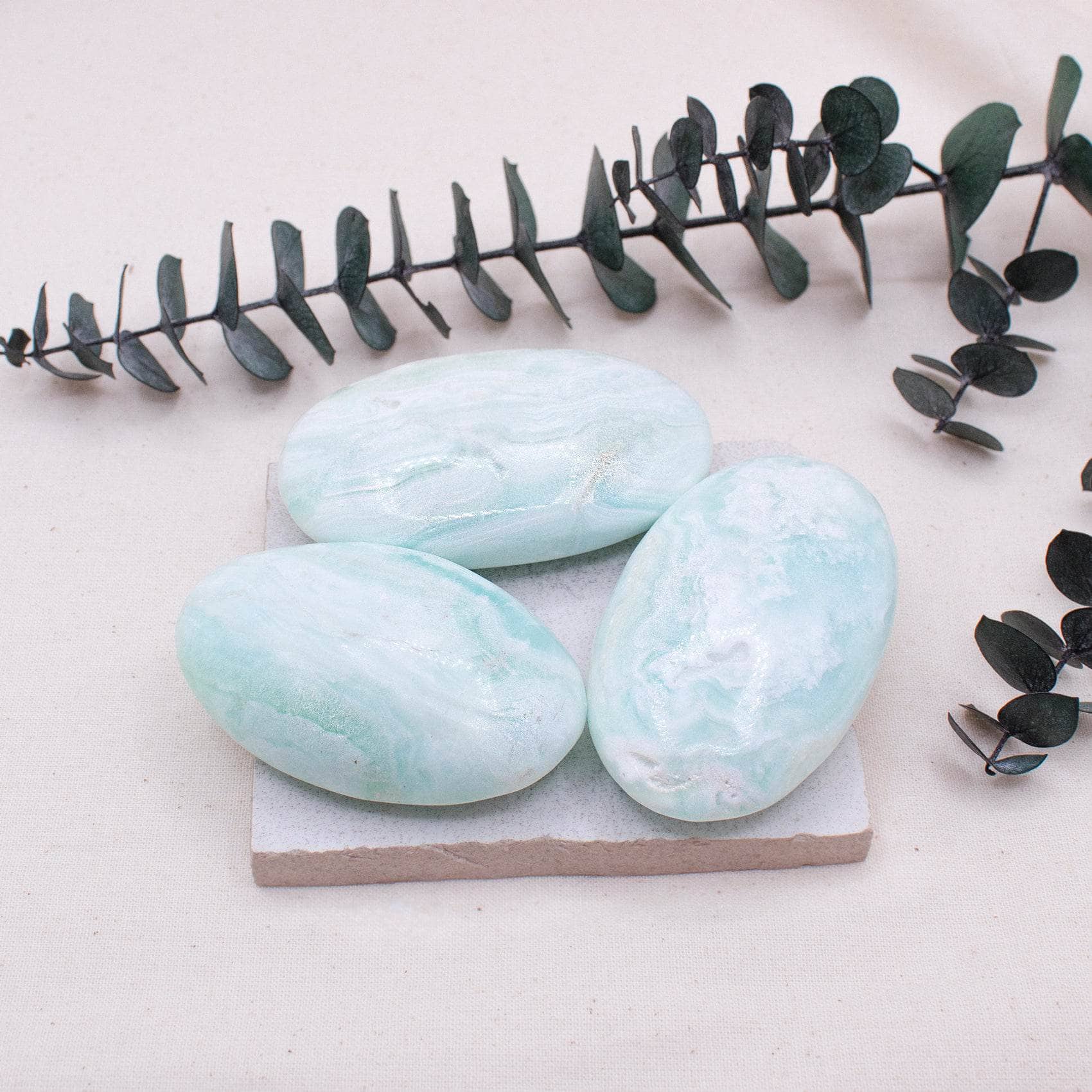 TR-BCAL-PALM-QE-S Blue Caribbean Calcite Palm Stones-AAA Premium Quality - Image 1
