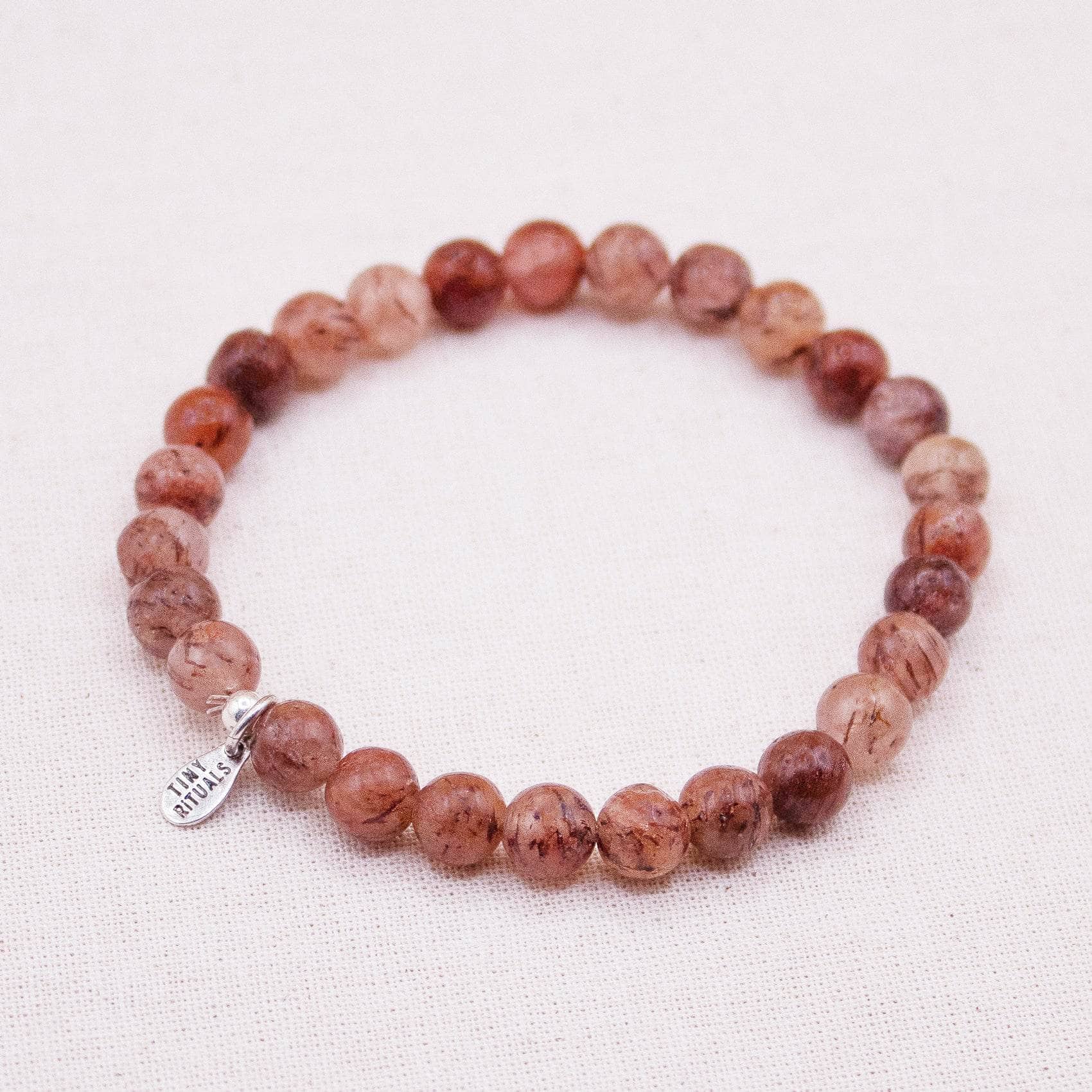 TR-MH01-AFG6-S-2_8f4509d6-8aeb-4c20-9d64-889fda44d0bc African Red Ghost Energy Bracelet - 6mm - Image 3