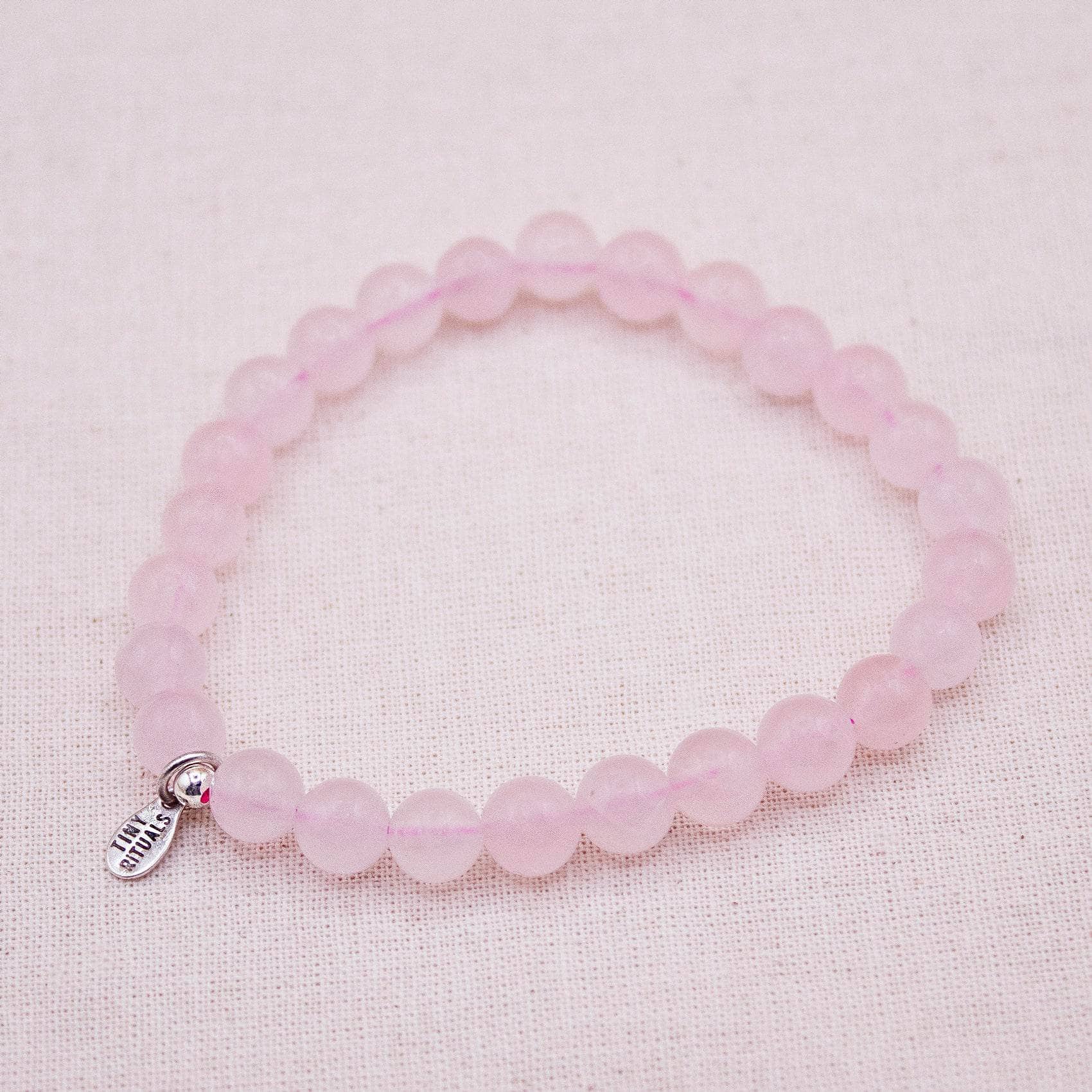 TR-MH01-MRQ6-S-2_4a1ed4b1-3775-4fd0-afaf-189de2533d24 Madagascar Rose Quartz Energy Bracelet - 6mm - Image 3