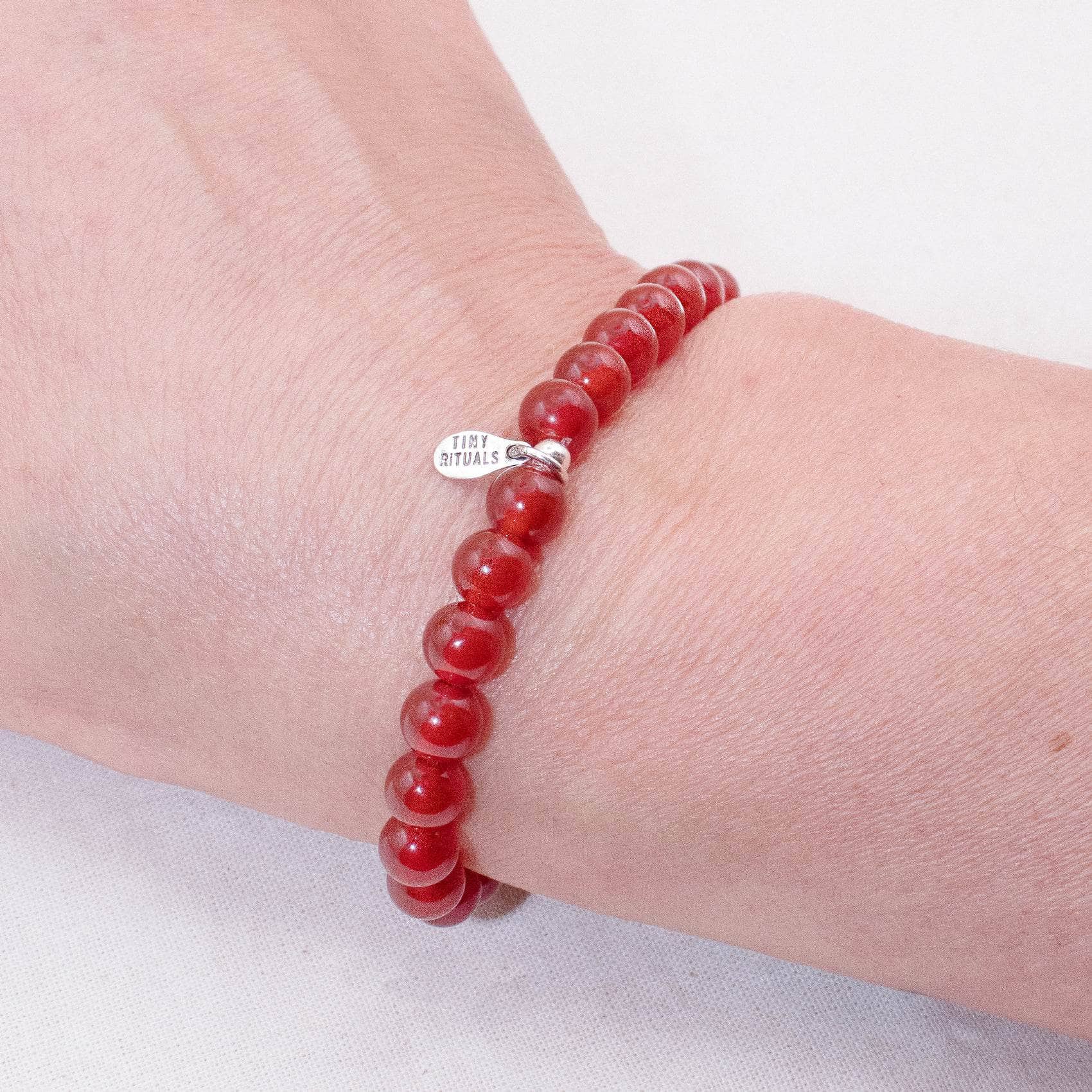 TR-MH01-RCAR6-S_f523734f-b24a-4c9f-8245-f5a20e65abc4 Red Carnelian Energy Bracelet - 6mm - Image 1