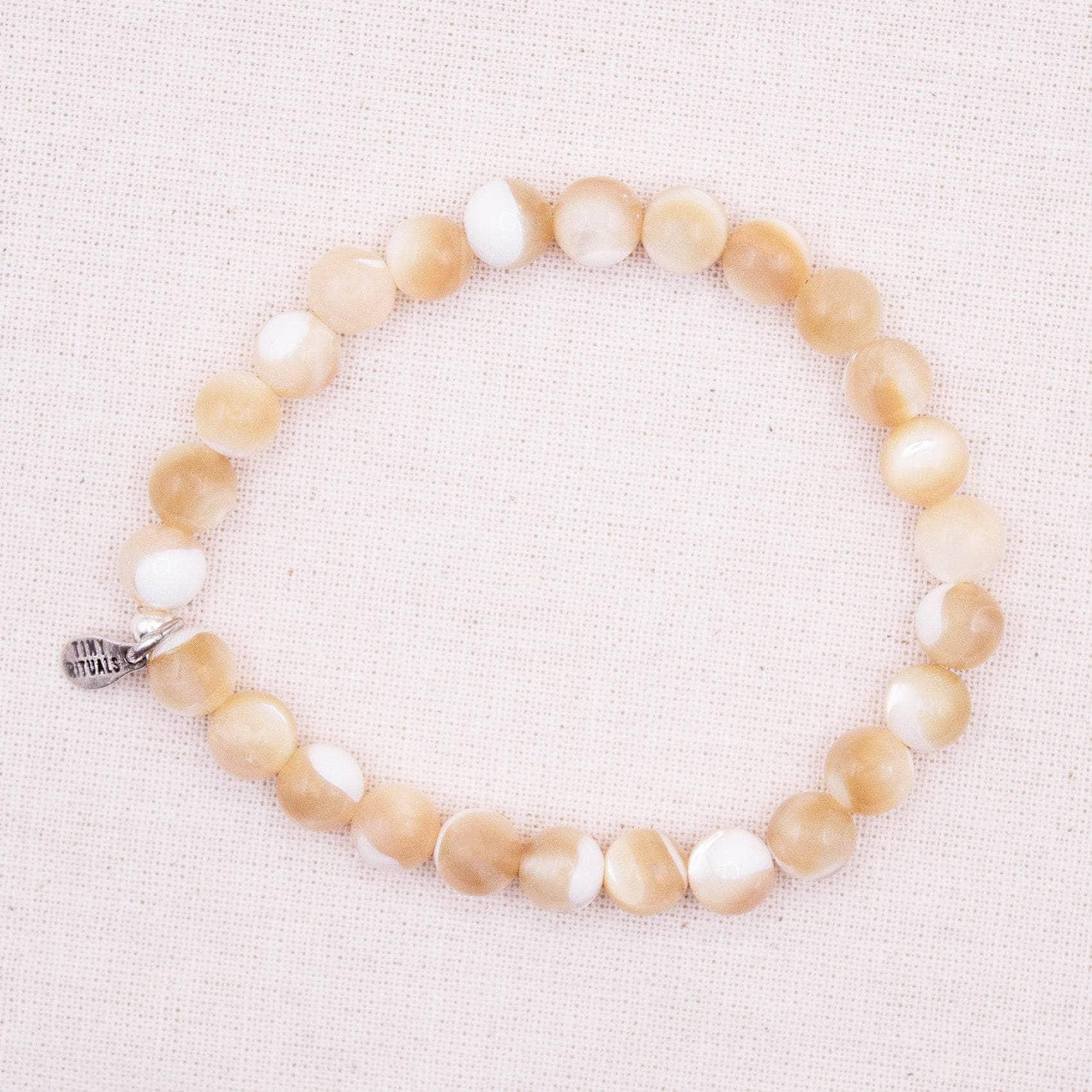 TR-MH01-TSS6-S-1_f1759e39-1116-45a2-902c-0f5fb171669d Trochus Sea Shell Energy Bracelet - 6mm - Image 1
