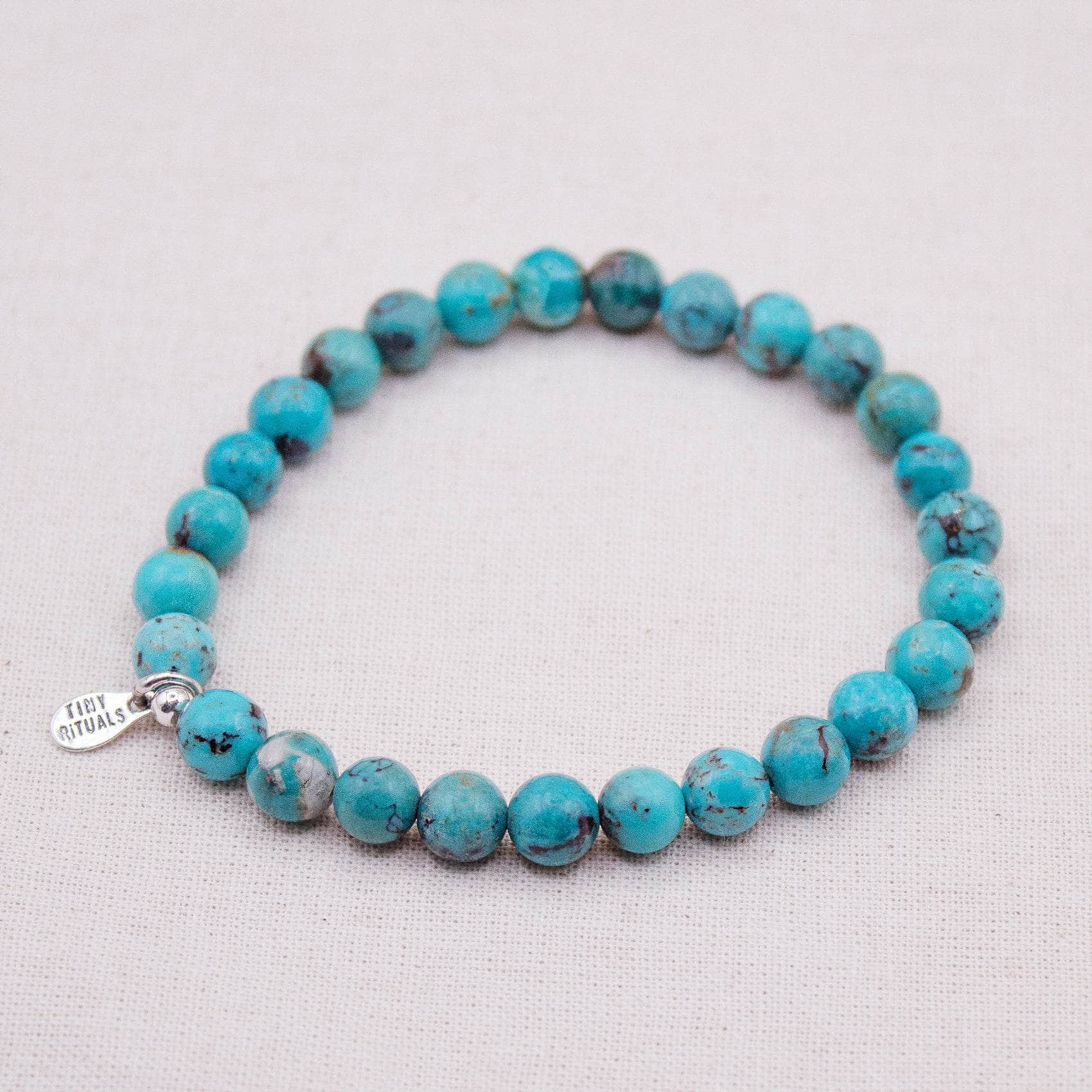 TR-MH01-TUR6-S-1_5079f85e-319f-4c08-a05e-ac149d7a2029 Rare Genuine Turquoise Energy Bracelet - 6mm - Image 4
