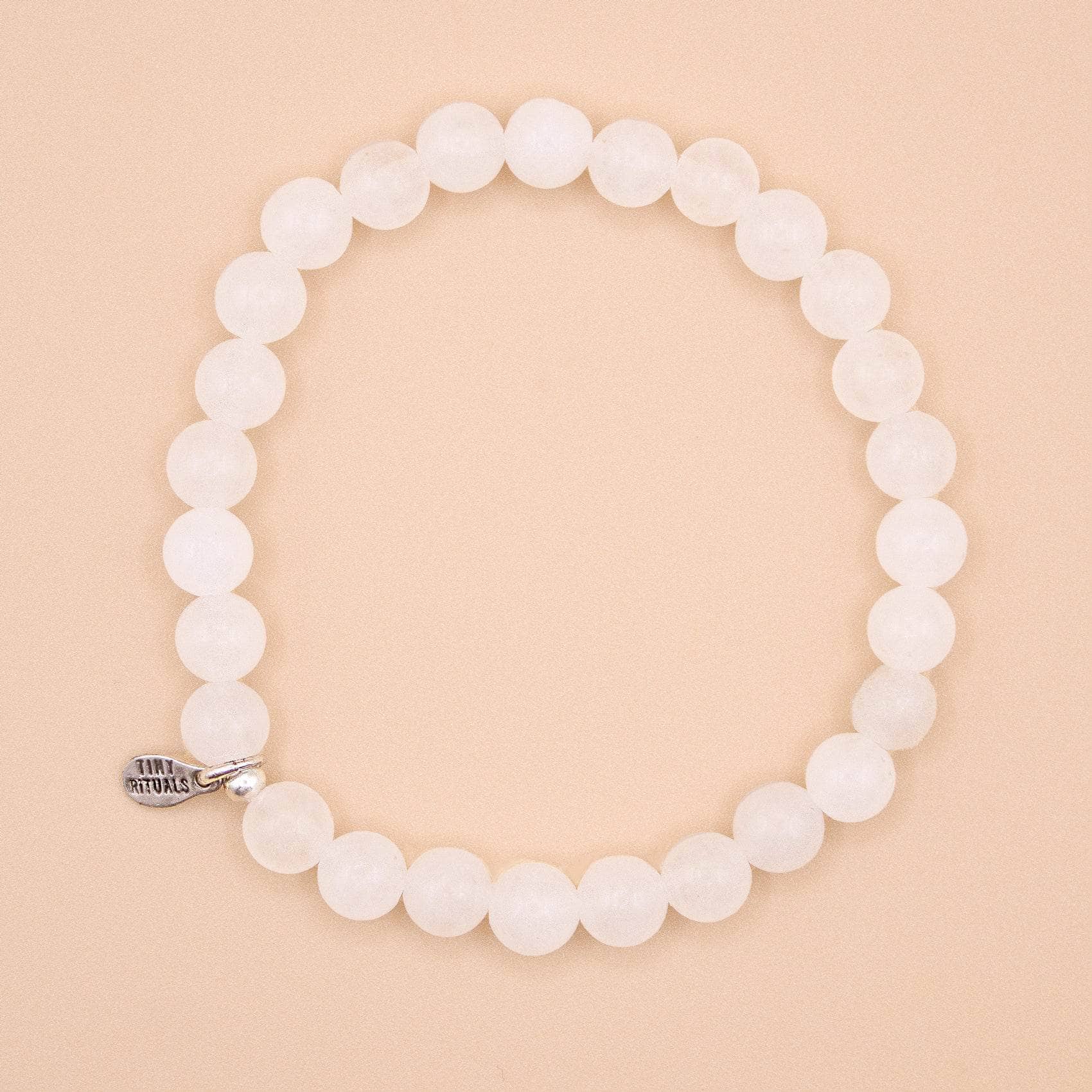 TR-MH01-WMJ6-S-3_b10db8f4-2d50-424f-a642-d2e988712a5e White Milky Jade Energy Bracelet - 6mm - Image 2