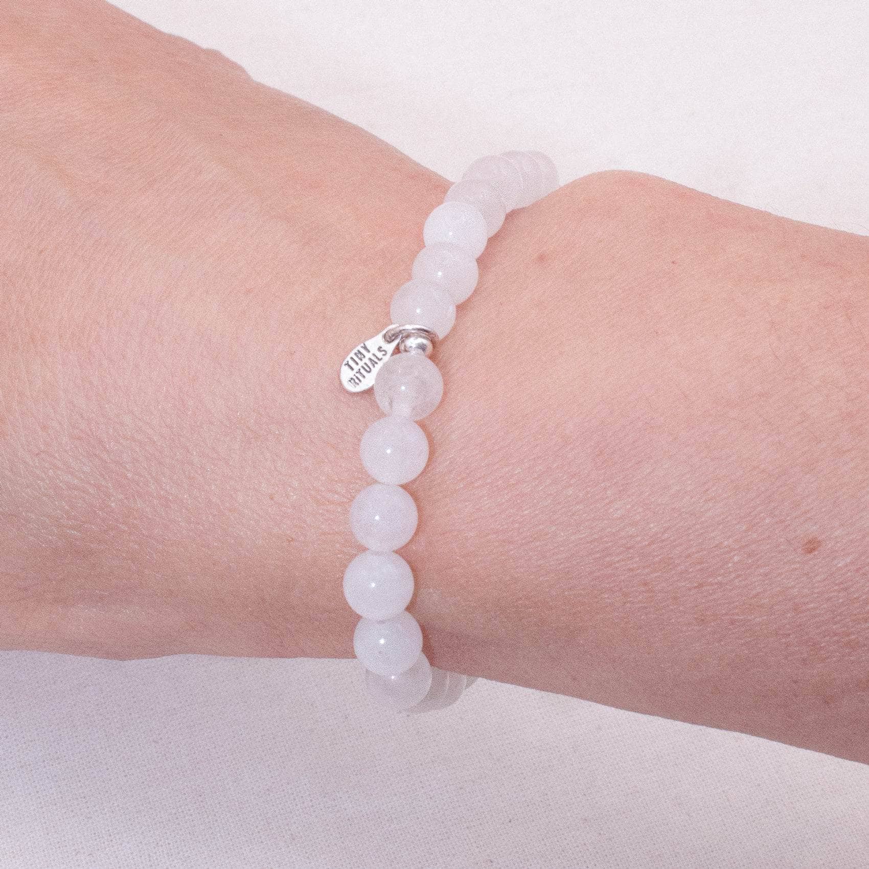 TR-MH01-WMJ6-S_94ad1539-240f-4773-bfce-80bc874d6df5 White Milky Jade Energy Bracelet - 6mm - Image 1