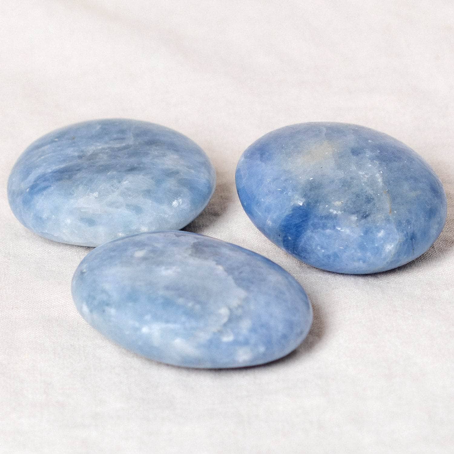 TR-PS-BCAL-MI-l-1_f8dea1ed-829e-403e-9d4a-aaccb3dc01f8 Blue Calcite Palm Stones - AAA Premium Quality - Image 11